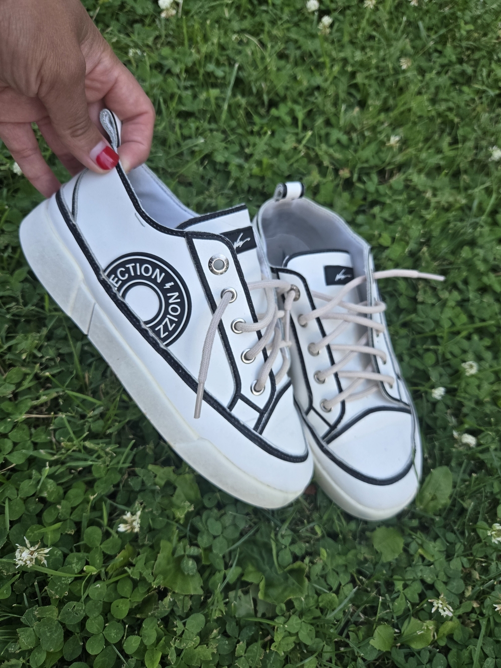 Kids White Low-Top Sneakers with Black Trim - Signature Style